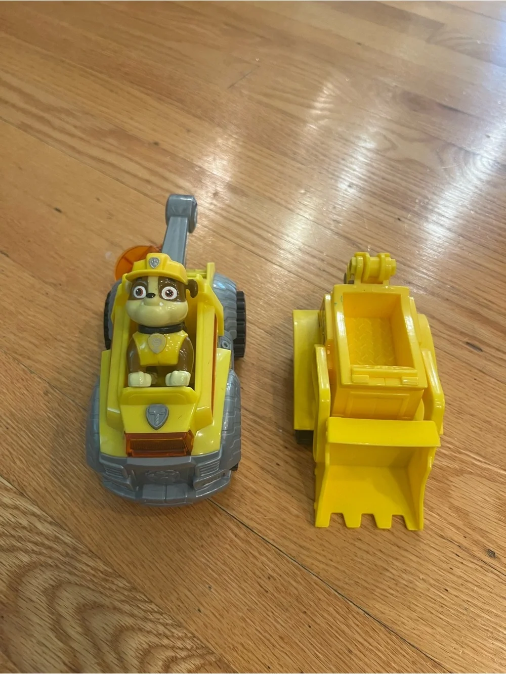 PAW Patrol Mighty Pups Paw Rubble Deluxe Vehicle Lights & Figure & tractor